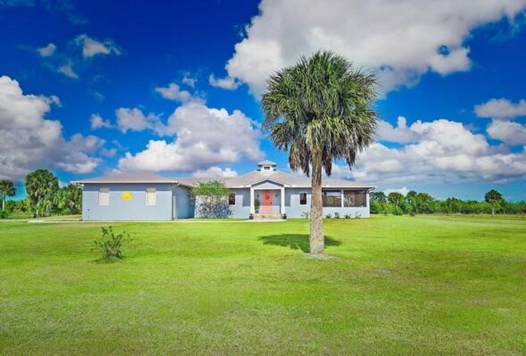 Photo of 2366 S Brocksmith Road, Fort Pierce, FL 34945 (MLS # R10988682)