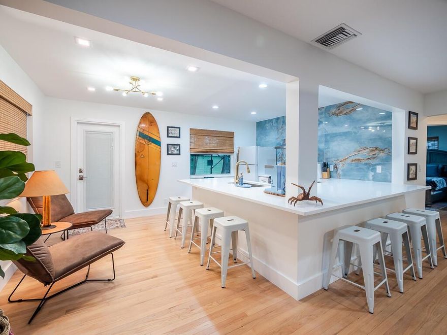 Welcome to your cozy retreat in the heart of Lake Worth Beach! This charming 2-bedroom, 1-bathroom single-family home is a perfect oasis for those seeking both comfort and convenience. Nestled in a tranquil neighborhood, this property boasts a natural bamboo filled backyard, creating an ambiance where you can relax and entertain guests around the fire pit. Location is key, and this home offers proximity to some of Lake Worth Beach's finest hangouts. You're just a stone's throw away from the beautiful beach, the intracoastal waters, and a great golf course. When you're not out enjoying the beach, you'll appreciate the convenience of being within walking distance from downtown, where you can explore a variety of restaurants, shops, and entertainment options.