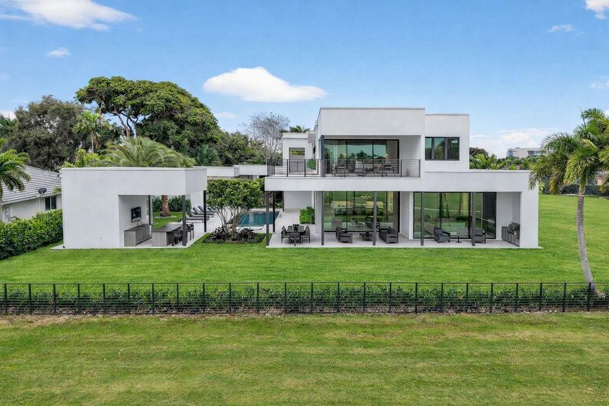 Almost half an acre of land & mesmerizing wide open fairway views! Newly completed to highest quality, fully furnished (minus art) CUSTOM Coral Ridge Golf Course Estate. Approx 12,000 sf, huge architectural/design emphasis on technology, entertaining & wellness. Amazing privacy & security, walled & gated courtyard entrance to stunning private pool area, separate guest house & pool pavilion, sauna & cabana bath. Covered Summer kitchen, wet bar & outdoor dining/sitting area. Elegant entry foyer, expansive great room, club room/bar, dining area, incredible Chef's kitchen, lounge area & home theatre. Superbly designed primary suite & home office, oversized custom closet/dressing room, spa bath, large balcony, gym & large secondary bedroom suites (2 on 1st floor). 4 lift compatible garage bays