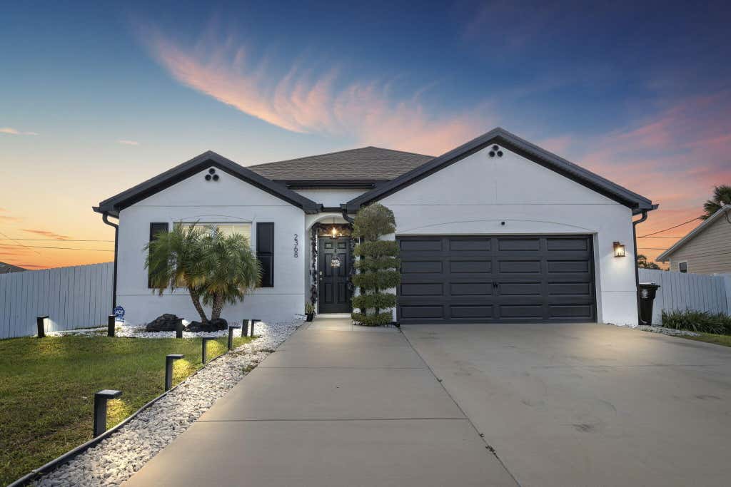 Photo of 2368 SW Neal Road, Port Saint Lucie, FL 34953 (MLS # R10941699)