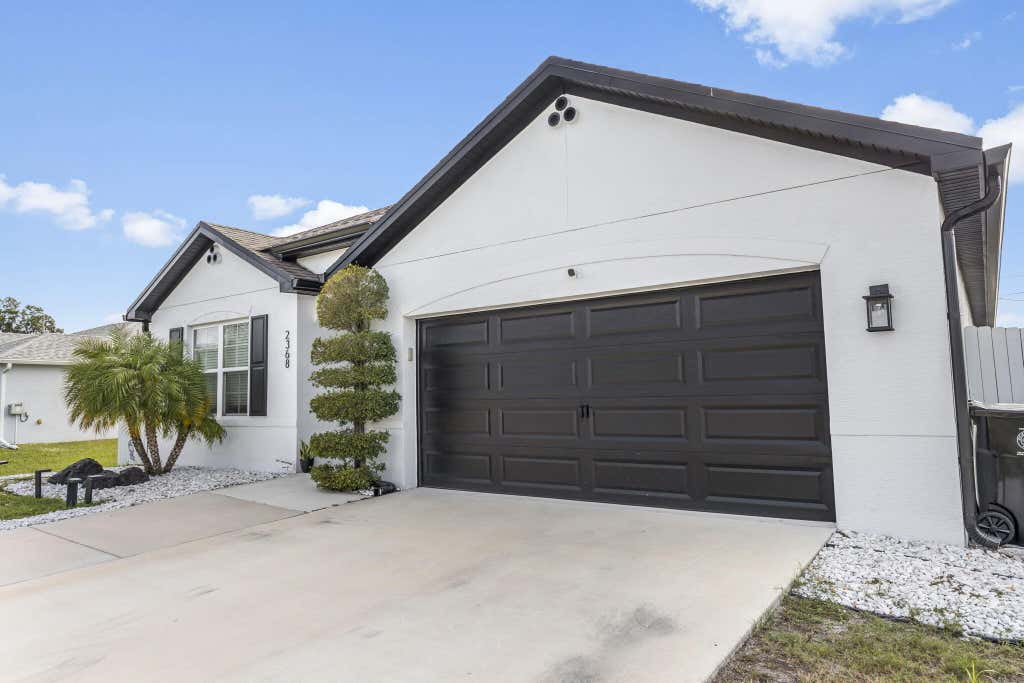 Photo of 2368 SW Neal Road, Port Saint Lucie, FL 34953 (MLS # R10941699)