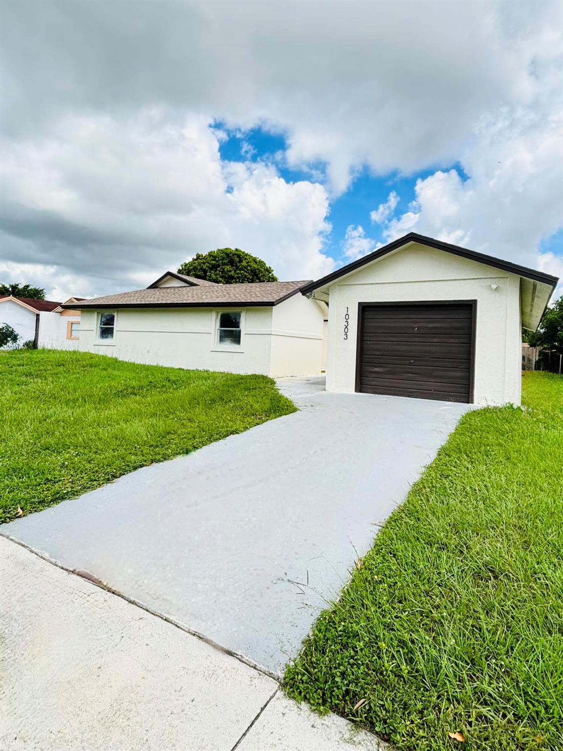 Welcome to this spacious 3BD/3B, fully renovated single-family home with over 2,000 sqft of living space! Featuring spacious open layout featuring tons of natural light and space. Perfect for families and those who need extra room to work or play. The property boasts a newly installed impact windows and doors, a new water heater and brand new roof. The interior has been refreshed with a gorgeous 12ft kitchen island, new bathrooms and new flooring throughout.Offers 1 car garage for ample storage and parking options.*Home is available for annual or seasonal rental*Tenant is responsible for utilities. First and Last month due at start of lease. No smoking is allowed in or around property.