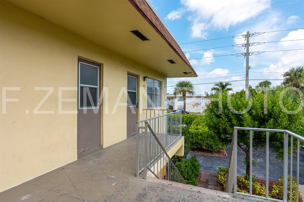 All measurements are approximate....New stone counter top, newly updated flooring and bathroom, kitchen as well. Corner unit plenty of natural light coming in from windows all around. This is a must see!Shared laundry facilities on the first floor, plenty of parking, close to FAU, I95, shops ans more!