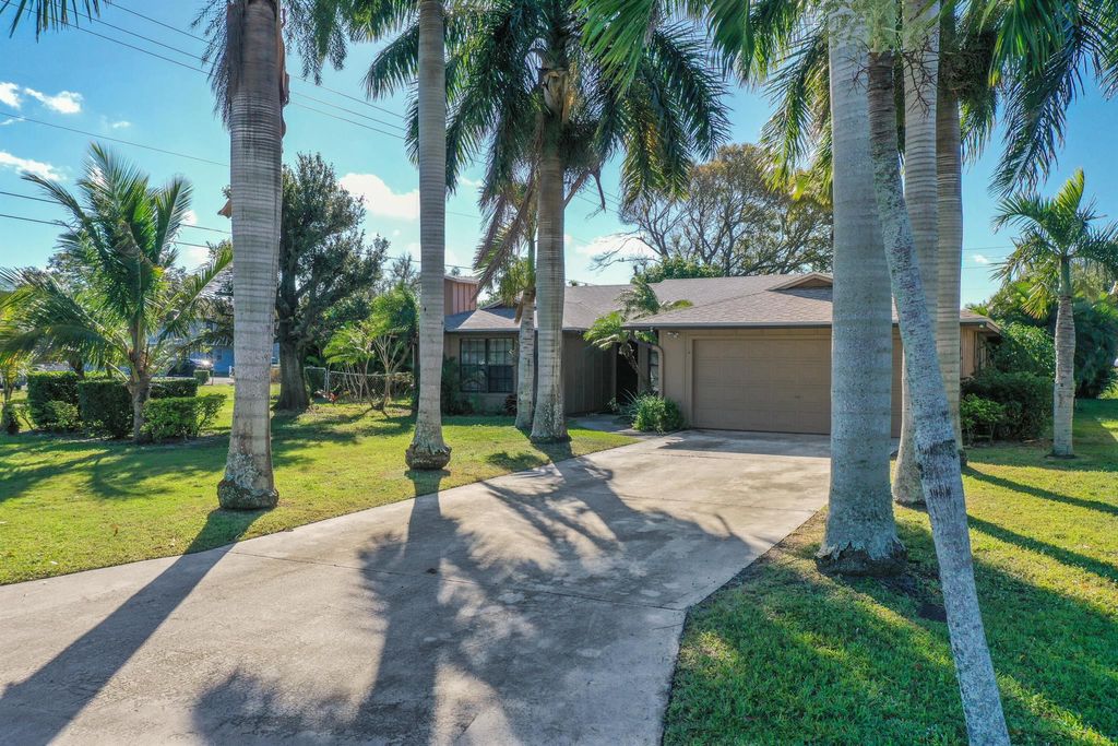 Photo of 699 Ixoria Avenue, Fort Pierce, FL 34982 (MLS # R10944159)