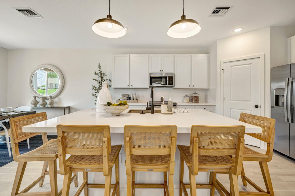 Photo of 900 NE Trailside Run #901, Port Saint Lucie, FL 34983 (MLS # R10942092)