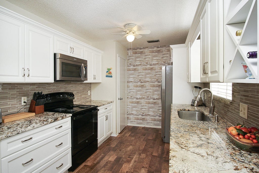 Photo of 12 Lake Vista Trail #101, Port Saint Lucie, FL 34952 (MLS # R11003340)