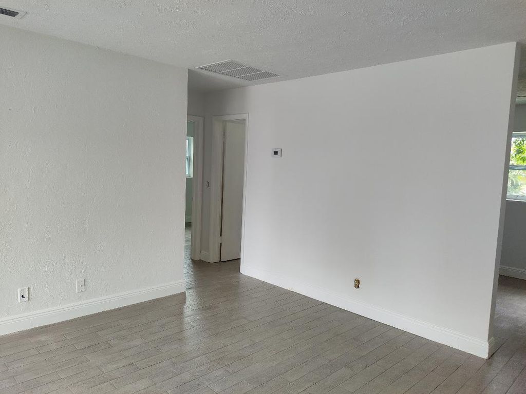 Photo of 830 Prosperity Farms Road, North Palm Beach, FL 33408 (MLS # R10958453)