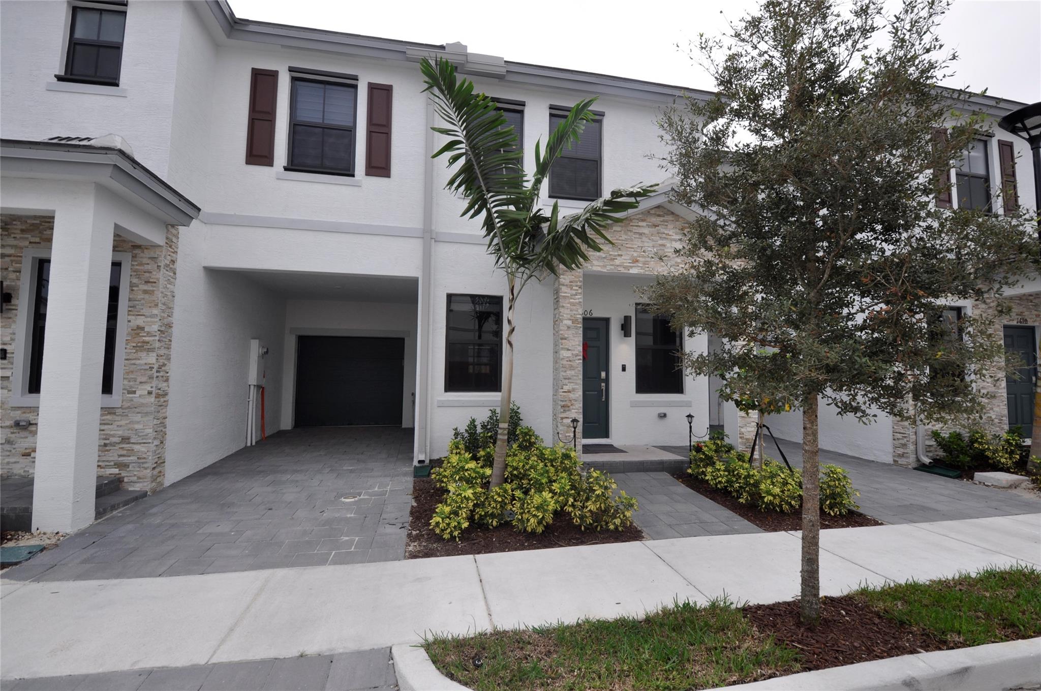 WONDERFUL!!! Smart TH in front of community pool, 3beds/2.5baths, Family Room, 1 car garage, paved driveway for up to 2 more cars. Modern TH. The well-appointed kitchen features Quartz countertops and stainless appliances. Tile throughout your 1st floor with soft carpet leading upstairs. The home has a private backyard. Washer & dryer. You are 2 mins from i95 and 10mins from beautiful Ft. Lauderdale beach and the famous Las Olas strip. Great schools, tons of entertainment and some of the best restaurants in town! This gated community with beautiful swimming pool. THIS is A MUST SEE!!!