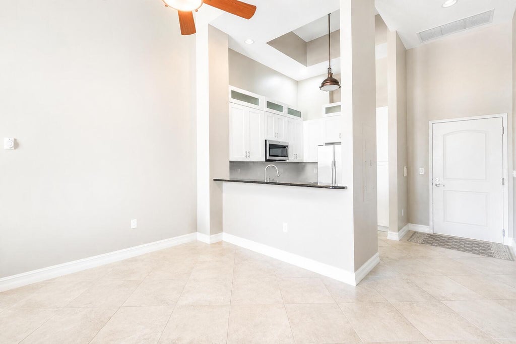 Photo of 701 S Olive Avenue #303, West Palm Beach, FL 33401 (MLS # B26043064)
