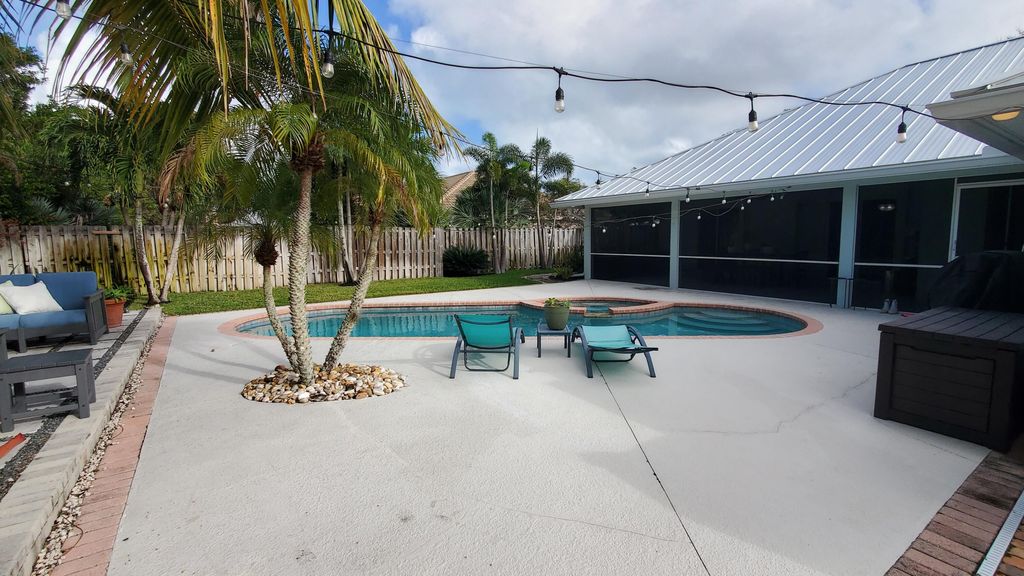 Photo of 8374 SE Woodcrest Place, Hobe Sound, FL 33455 (MLS # R11046277)