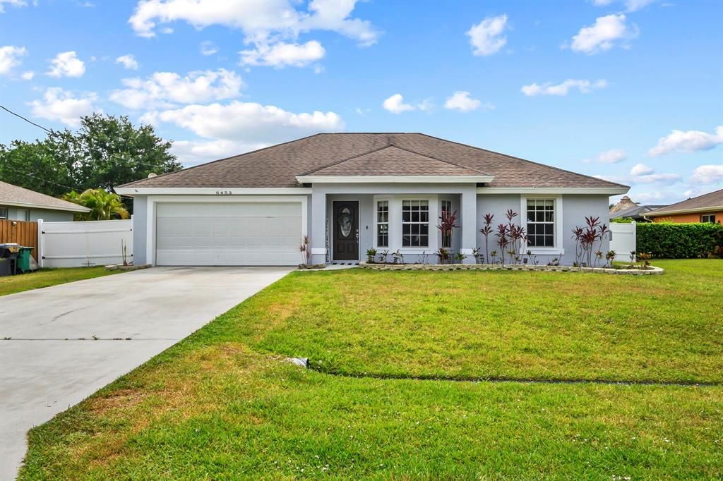 Photo of 6453 NW Hacienda Lane Ln, Port St Lucie, FL 34986 (MLS # R10720593)