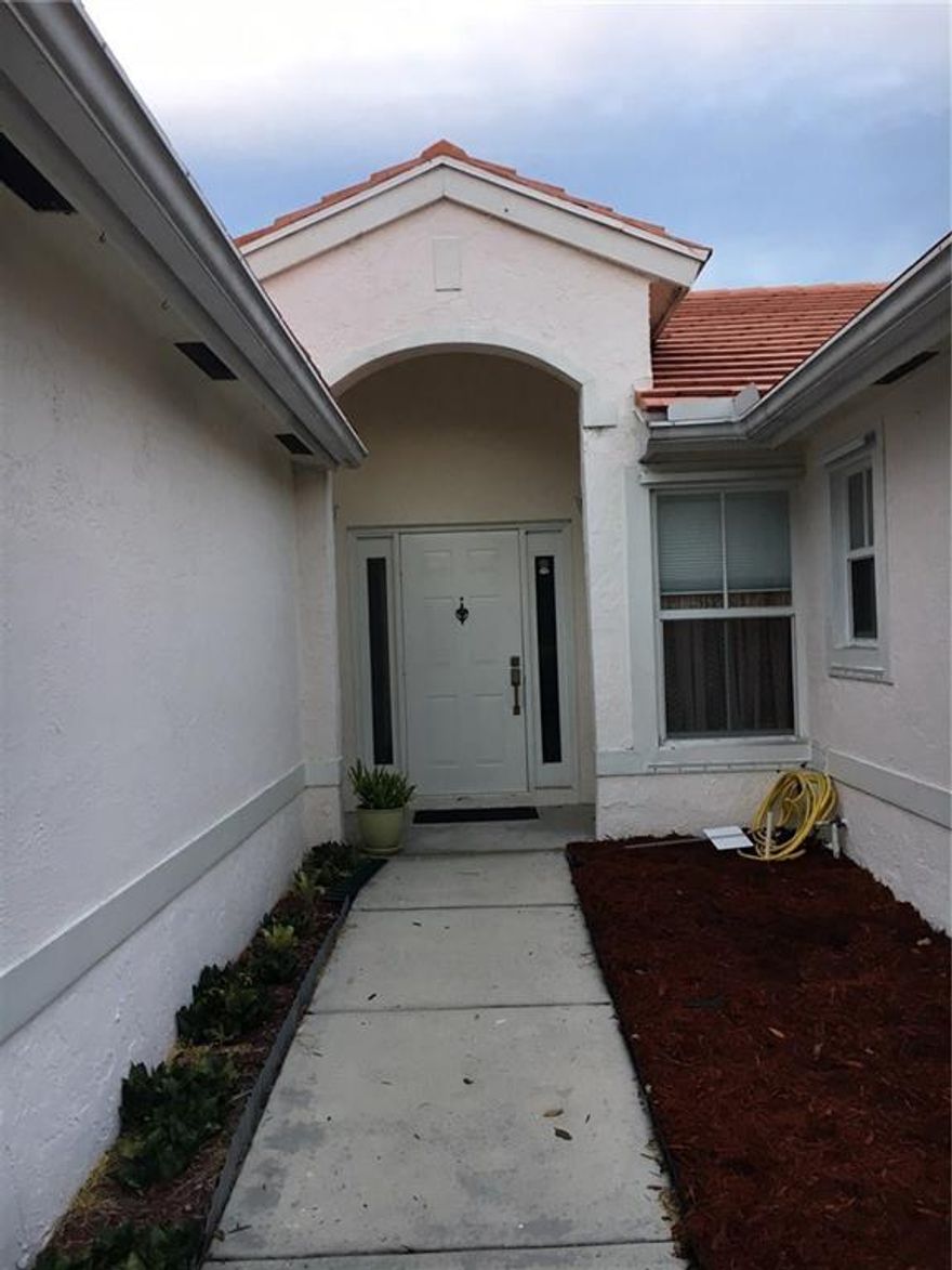 4/2 in sought after community. Home has.split floor plan, covered patio area and beautiful lake view. Home needs some updating. Community has tot lot, basketball, tennis, and 3 community pools.Close to turnpike, bus routes, restaurants and shopping.Please use AS IS CONTRACT.