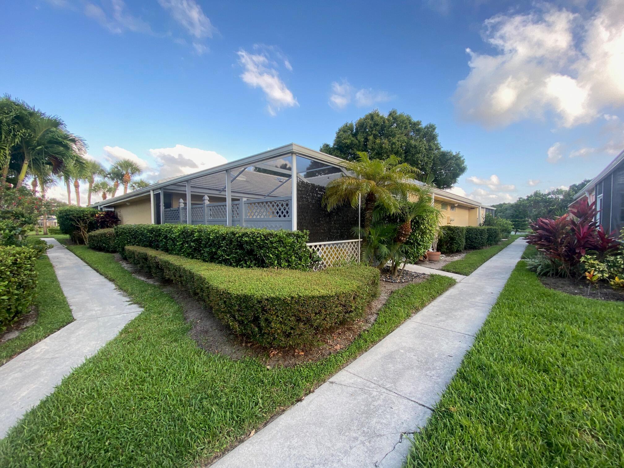 This beautiful single story townhouse is located in the highly desirable neighborhood of Lake Catherine. This is a beautiful 2 bedroom 2 bathroom single story townhouse with an open floor plan and a large screened in patio with separate storage area and community pool. Unit has Stainless steel appliances to include Refrigerator, Microwave, Dishwasher and Range. There is also a washer and dryer in the unit. All rooms are beautifully tiled. Lake Catherine is located in one of the most highly desirable areas in Palm Beach County. Located just east of I-95 this property is close to Downtown, Malls, beaches, Palm Beach International Airport, retail shops, fine dining, A rated schools and more. These units are rarely available to the market and highly desirable.