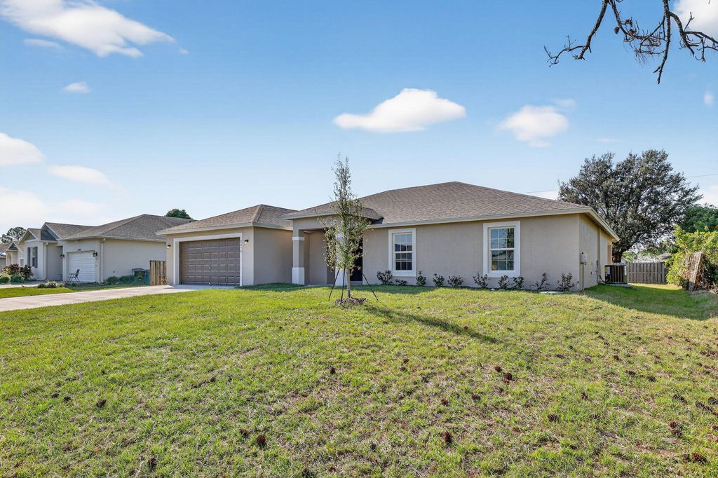 Photo of 3474 SW Funtuna Street, Port Saint Lucie, FL 34953 (MLS # R11131428)