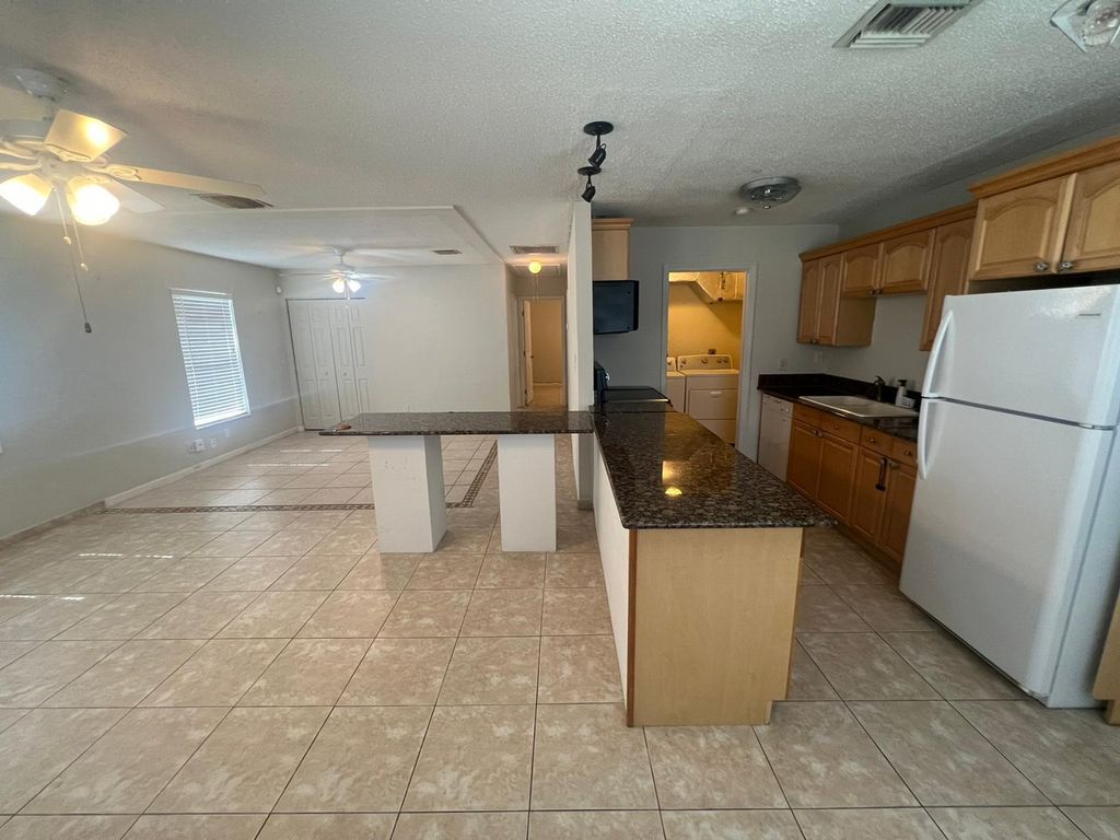 Photo of 1012 Pottawatomie Street, Jupiter, FL 33458 (MLS # R11115843)