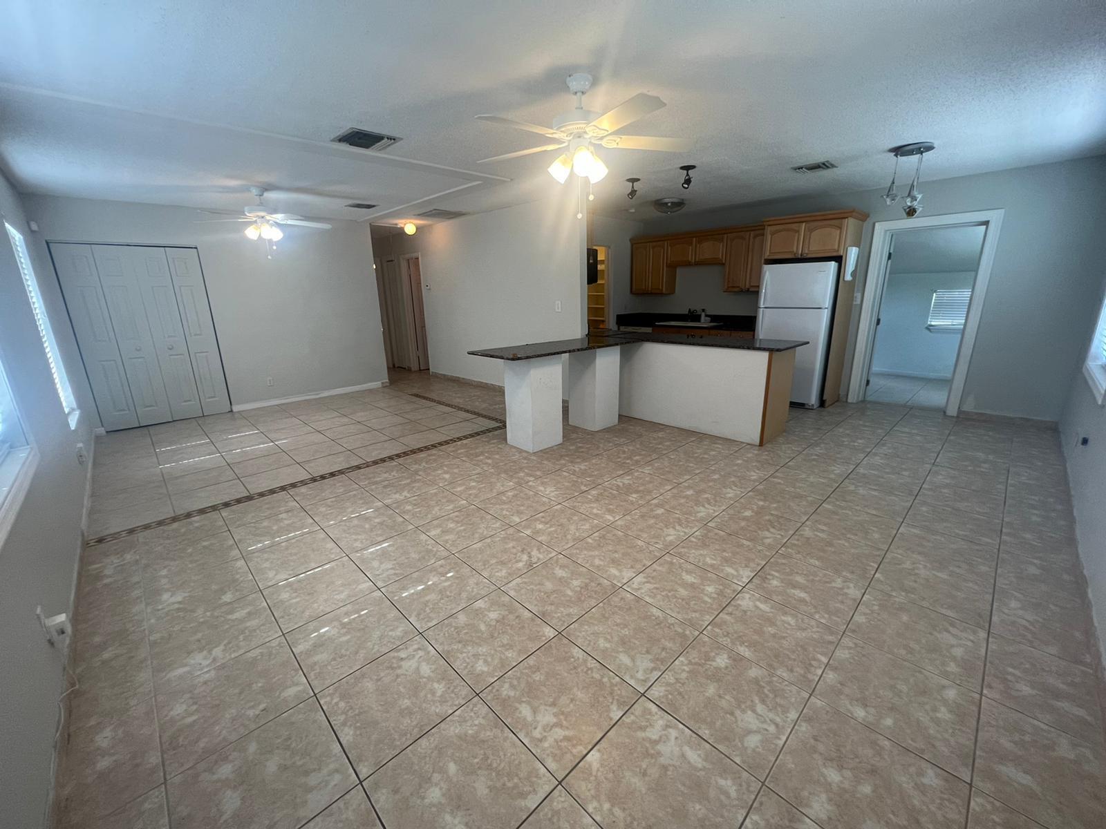 Beautiful Updated 4/2, Kitchen with Granite Counters, Stainless Steel Appliances, Renovated Bathrooms, all Tiled, No carpets, New Fixtures, Freshly Painted, Shed on the back that can be use as warehouse, Close to the beach and restaurants! great location!