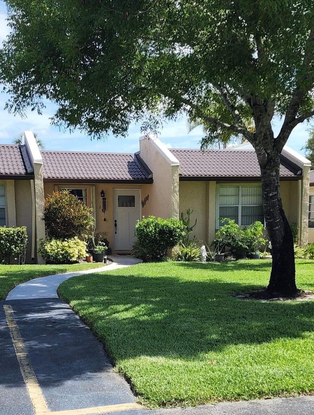 Photo of 237 Lake Meryl Drive, West Palm Beach, FL 33411 (MLS # R10803991)