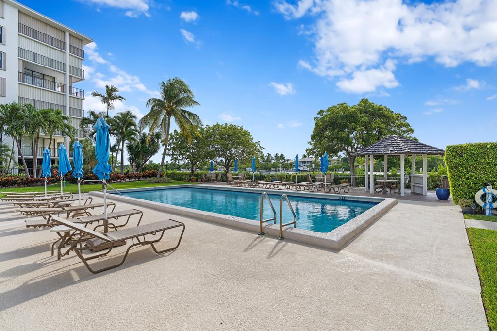 Photo of 3545 S Ocean Boulevard #405, South Palm Beach, FL 33480 (MLS # B26007632)