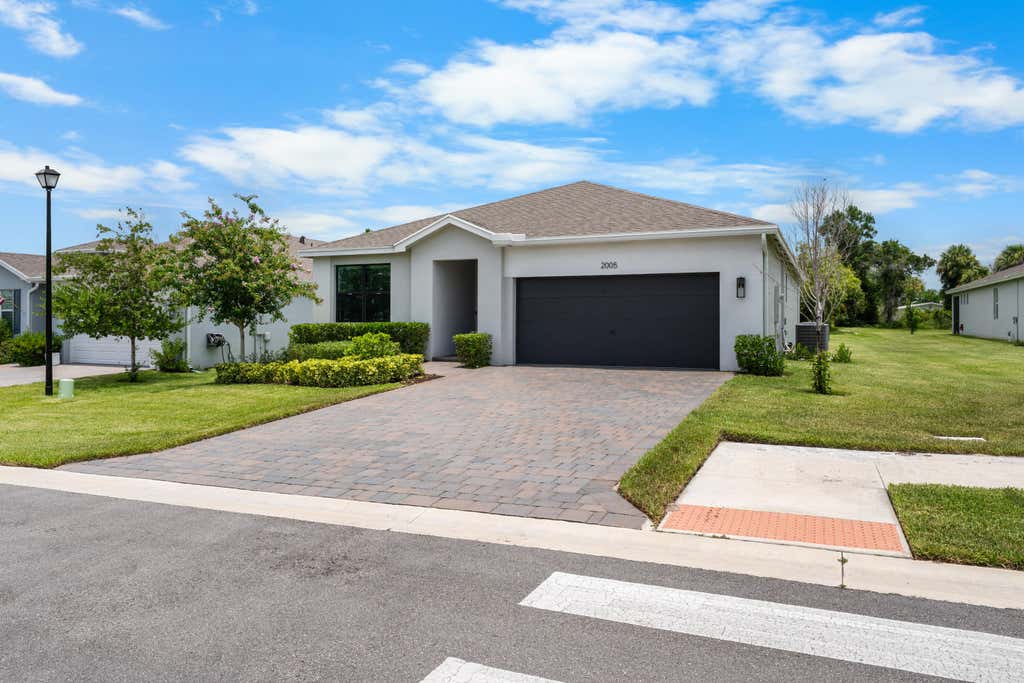 Photo of 2005 NE Ocean Dunes Drive, Jensen Beach, FL 34957 (MLS # B26058651)