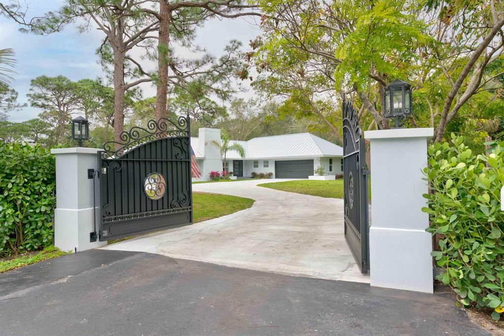 Photo of 5608 Old Fort Jupiter Road, Jupiter, FL 33458 (MLS # R10856439)