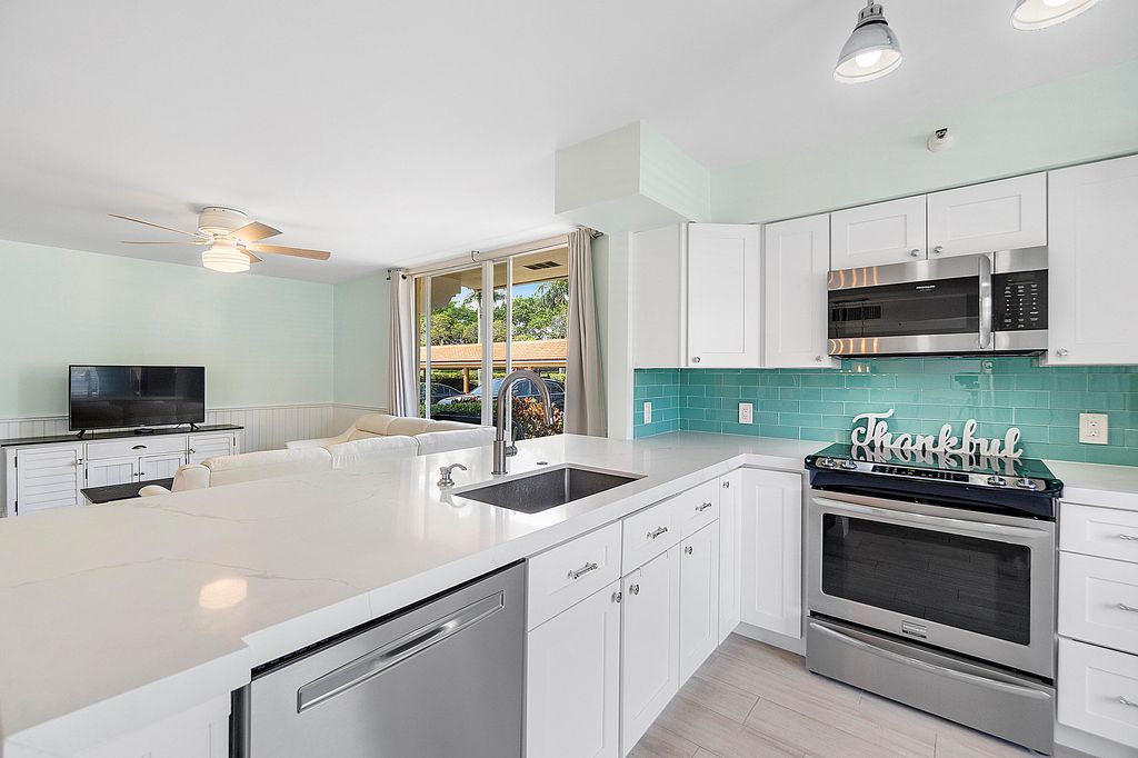 Photo of 123 Yacht Club Way #101, Hypoluxo, FL 33462 (MLS # R11164077)