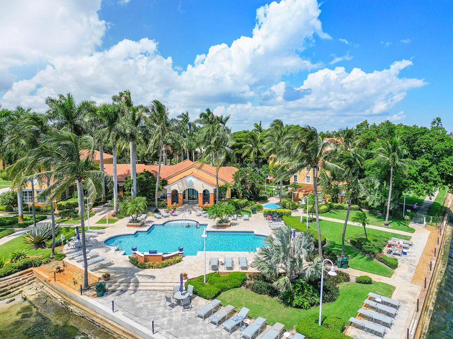 Absolutely stunning rarely available corner unit three bedroom two and half bath townhome residence just steps away from Florida's Intracoastal waterway. Tastefully upgraded throughout, this Yacht Club on the Intracoastal property is ready to impress. Open quartz kitchen with stainless appliances look out to the bright and spacious living room and formal dining - perfect for entertaining guests. Glass showers in every bath, with matching vanities throughout. Enjoy dinner with a view every night; eat under the stars as unit is a quick walk to the peninsular pool deck, overlooking the intracoastal. Garage/Dock space avl via private lease, upon availability. You'll want to make this vacation destination your permanent home. Comes with Covered Carport space.