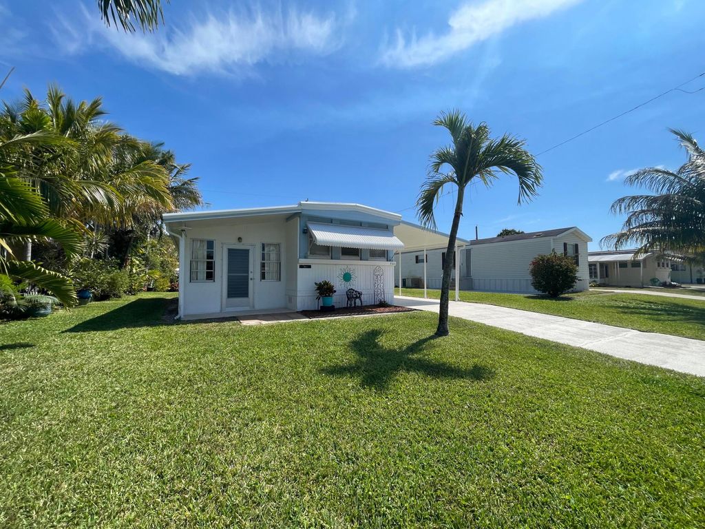 Photo of 8351 SE Skylark Avenue, Hobe Sound, FL 33455 (MLS # R11066217)