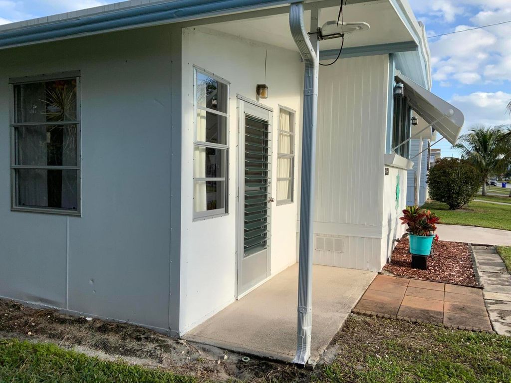 Photo of 8351 SE Skylark Avenue, Hobe Sound, FL 33455 (MLS # R11066217)