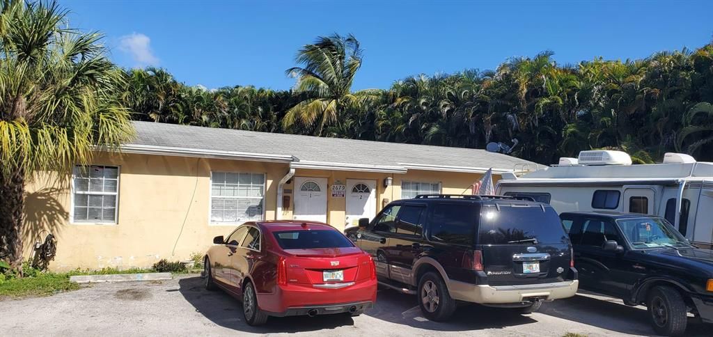Photo of 2679 Helyn Road Rd, Lake Worth Beach, FL 33461 (MLS # R10776824)