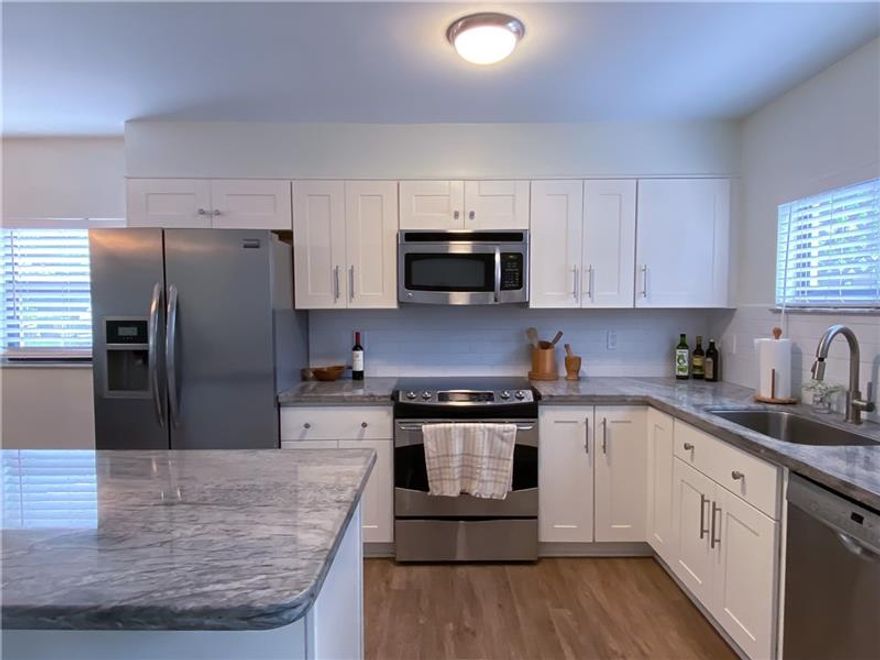 Location location location! Beach living at this beautiful, bright, updated townhouse. Located on the island just a block away from the beach and the intracoastal!! Lots of upgrades and extras here, including the kitchen and bathrooms, impact windows and doors, and a private back patio. This is a very small, private community of only 7 units and feels like your very own beach resort. Within walking distance to the brand new Pompano Beach boardwalk, pier, restaurants and shops.