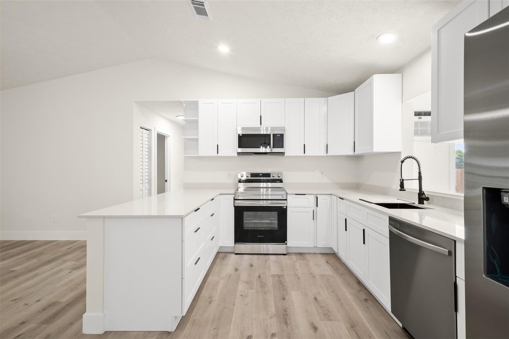 Photo of 461 SW Meadow Ter, Port Saint Lucie, FL 34984 (MLS # F10527345)