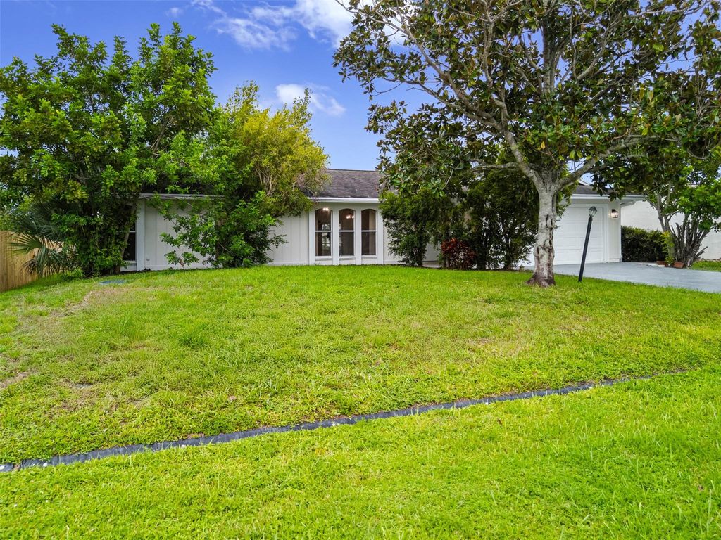 Photo of 461 SW Meadow Terrace, Port Saint Lucie, FL 34984 (MLS # F10527345)