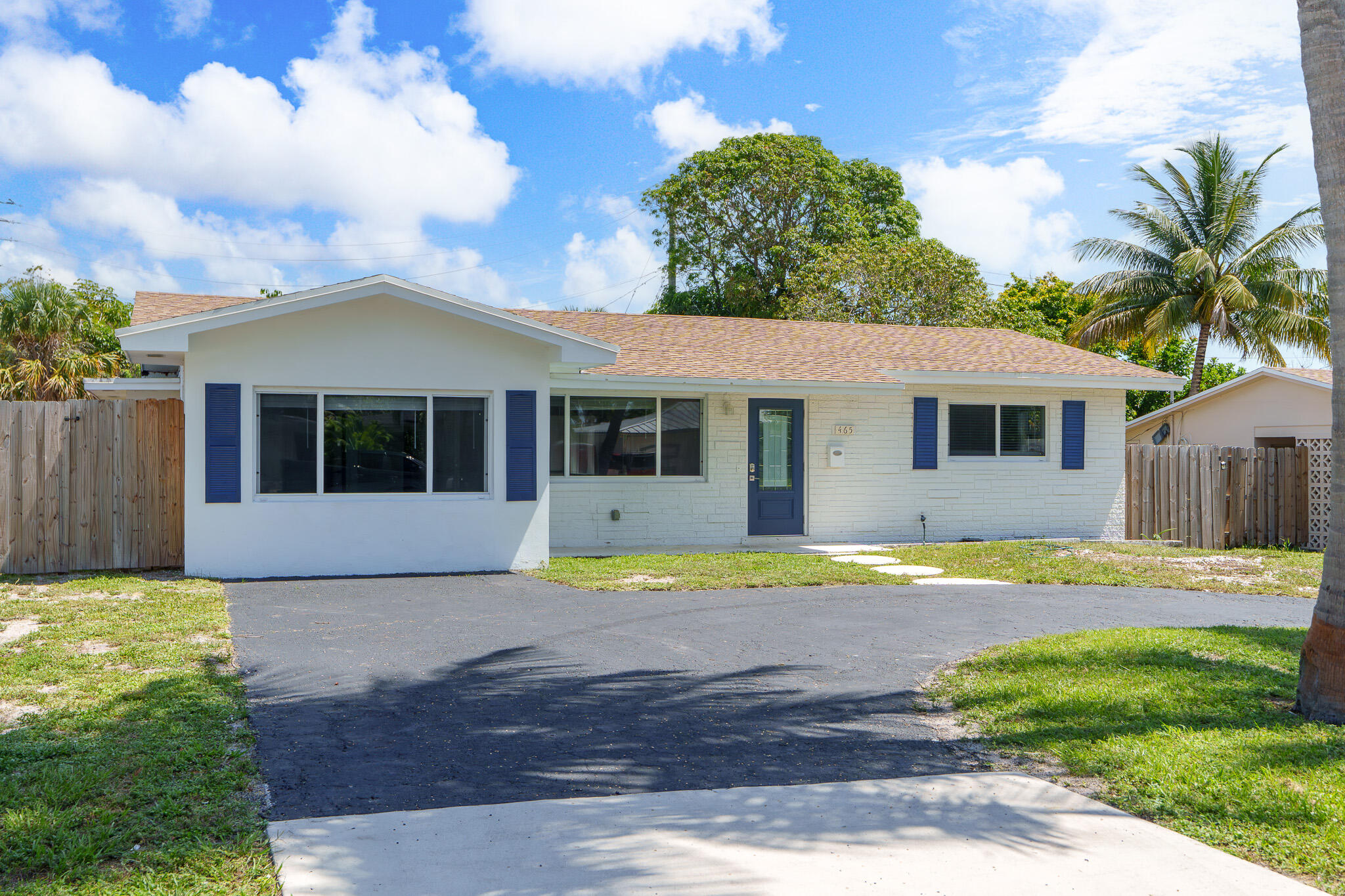 You have to see this Renovated single-family home today! Gorgeous kitchen, 2019 roof, complete impact windows and doors, all newer sewer piping changed out from cast iron to PVC with fully fenced in backyard. Air conditioner and Tankless Instant hot water heater are newer as well. This home is 4 bedrooms and 2 bathrooms, plus a Florida Room. Almost 10,000 square foot lot with wide double opening fence door to easily fit your boat/RV/etc... No HOA! East Boynton Beach location is under 2 miles to the Beach, tons of shopping, downtown events and fun all around!