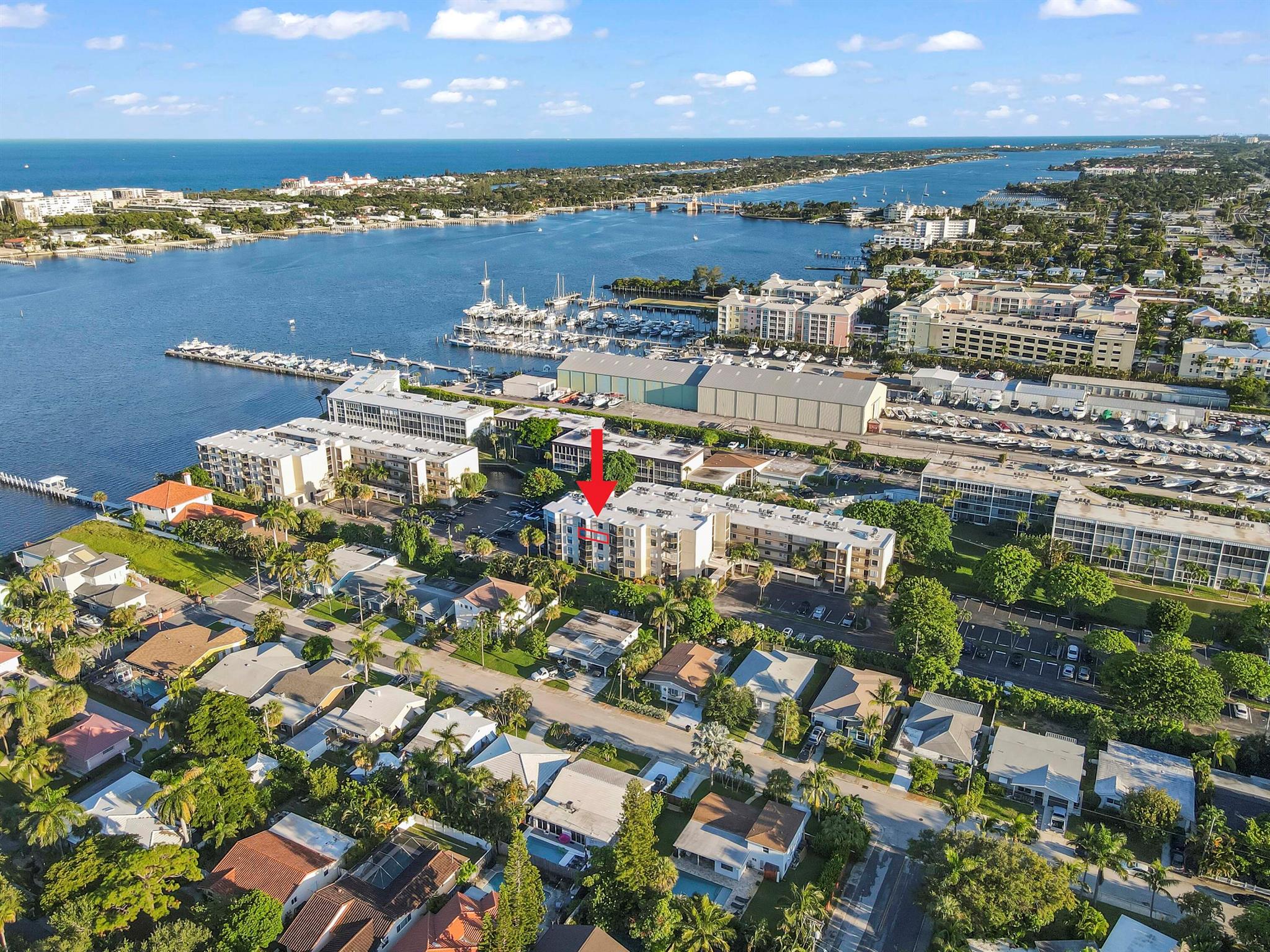 Welcome to Hidden Harbour of the Palm Beaches Condo, a sought-after waterfront community in Lantana, FL. This 4th-floor unit in a 5-story building offers intercoastal view, accessible by exterior catwalk and elevator. Featuring 1,025 sq. ft. of living space, this home includes 2 bedrooms and 2 baths, each with its closet, plus a covered balcony with great views of the intercostal.The interior boasts large tile flooring in the living, dining area and second bedroom, while the master bedroom feature carpeted floors for comfort. The kitchen comes equipped with appliances, including an electric range, microwave, refrigerator, and ample cabinets for storage. Additional features include accordion shutters for peace of mind.