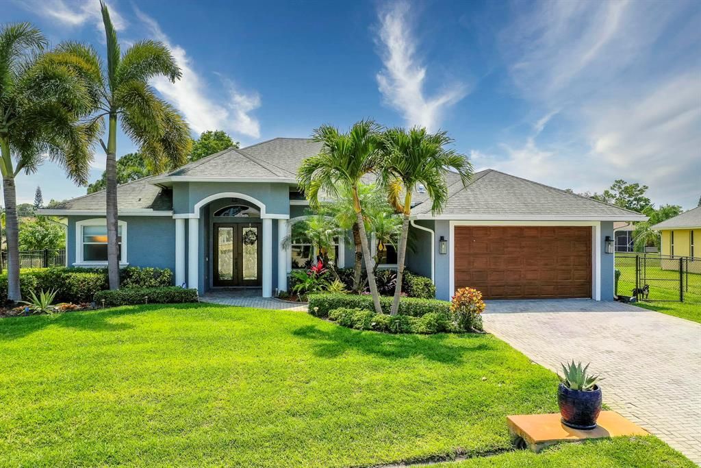 Photo of 317 SE Fisk Road, Port Saint Lucie, FL 34984 (MLS # R10802665)