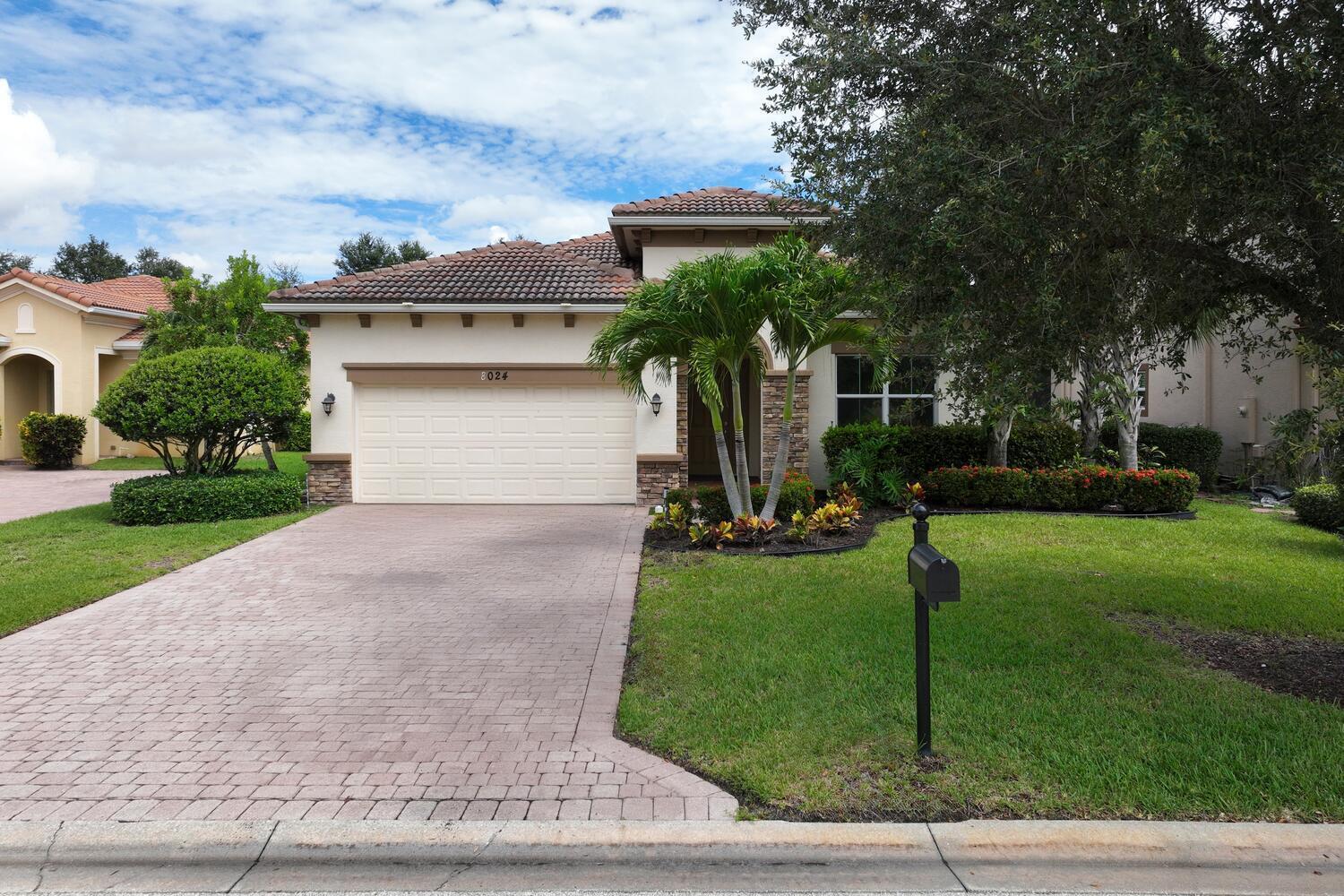 Welcome to Savannah Estates (aka Venetian Village)! This well-maintained 2BR/2BA + flex room CBS home with a 2-car garage is ideally located on a cul-de-sac street in this gated community of 50 homes. Built by Kolter in 2013, the flexible bonus room is perfect for a home office or hobby space. The spacious kitchen has granite countertops, SS appliances, abundant storage including a pantry, & a large island--open to the family room & overlooking the screened lanai with an extended paver patio.Tile floors cover the main living areas, while wood floors warm the bedrooms. Recent updates include HVAC (2025) & refrigerator (2025). Outdoor enthusiasts will appreciate nearby parks, beaches, championship golf, & world-class fishing. PBI is approx 45 minutes away. Pet-friendly--up to 3 allowed!