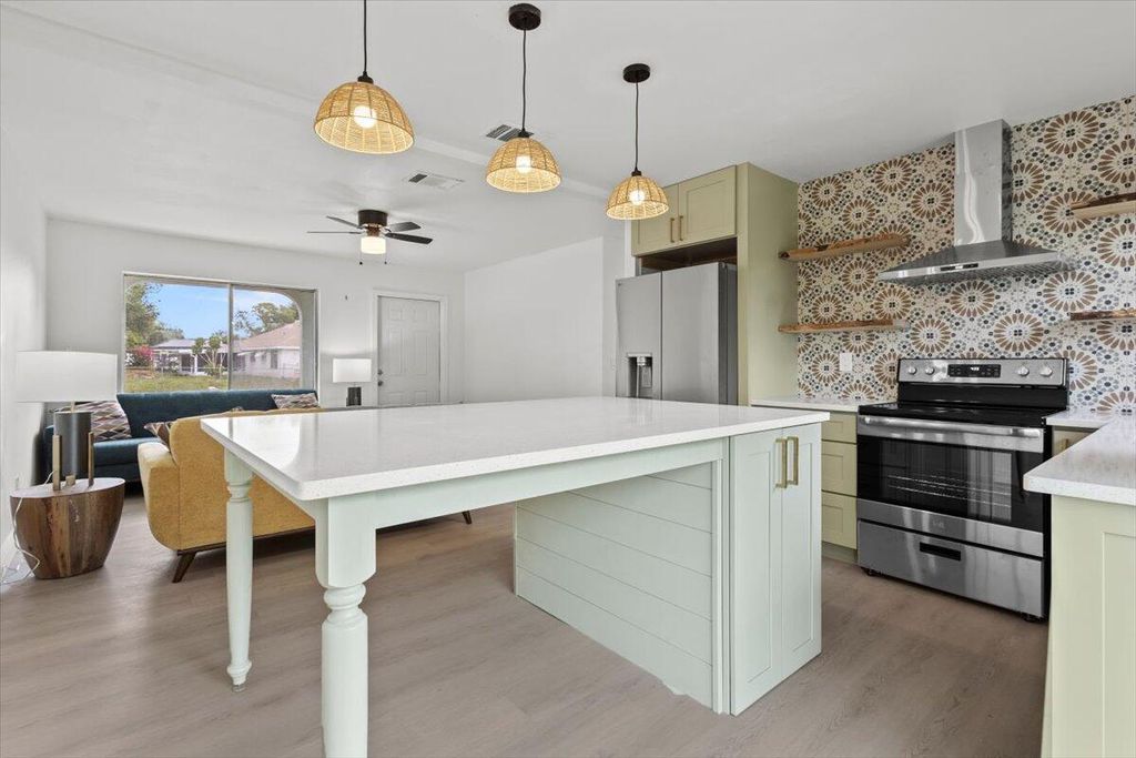 Photo of 610 SW Old Briar Avenue, Port Saint Lucie, FL 34953 (MLS # R10991311)