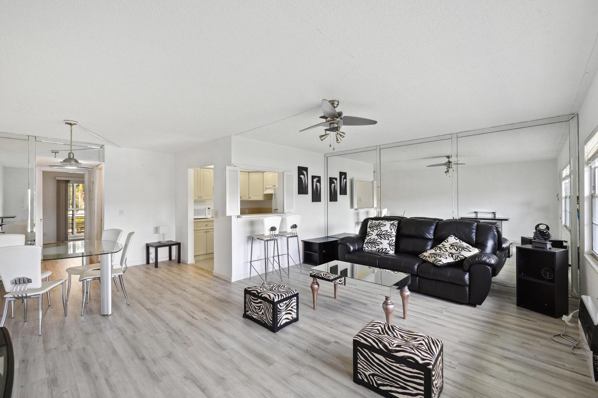 ""Special offer: Owner is offering 1st month rent free"" Lovely 1 Bedroom and 1.1/2 Bath at Suffolk in Century Village, 55+ Community full of amenities, own storage, indoor and outdoor pools, club House, exercise room, activity room, shuffleboard, tennis & pickleball courts, side walks and gardens. Bus transportation, gated community. Must see to love it. Vacant, EASY TO SHOW. (1) parking assigned and guess parking. Unit partially furnish. Rent includes: High speed internet/WiFi, cable, water, and all amenities included in the rent.