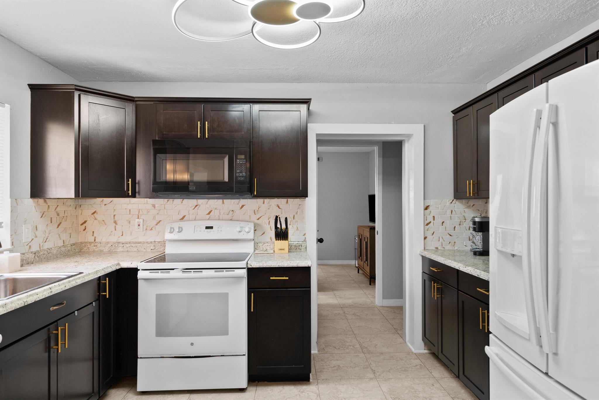 THE TROPICS REVISED - Residential Lease