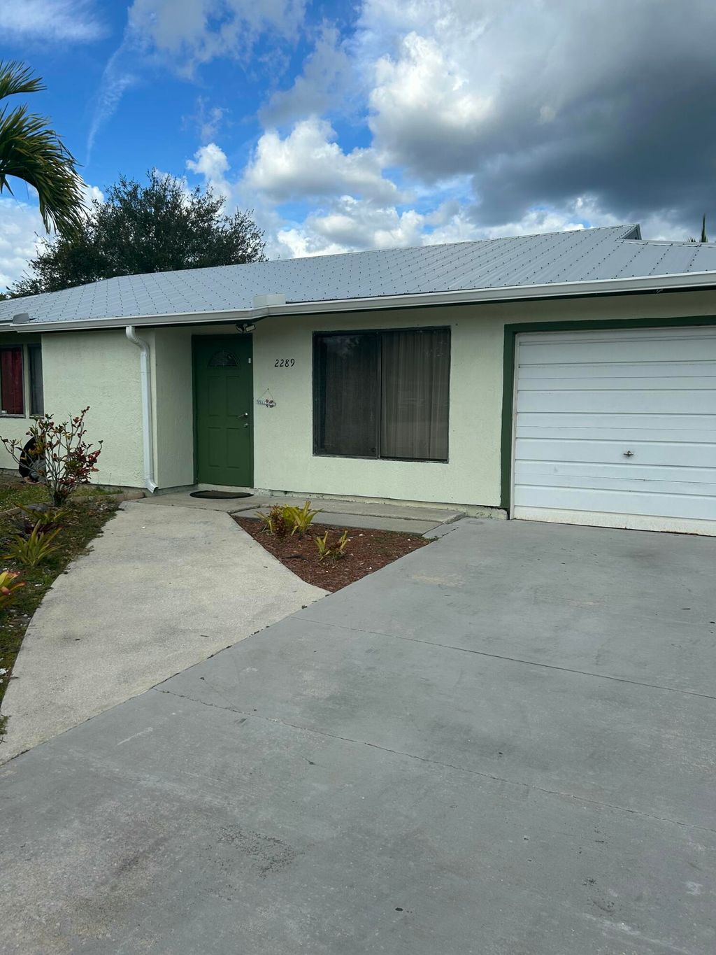 Photo of 2289 SE Seamist Street, Port Saint Lucie, FL 34952 (MLS # B26021992)