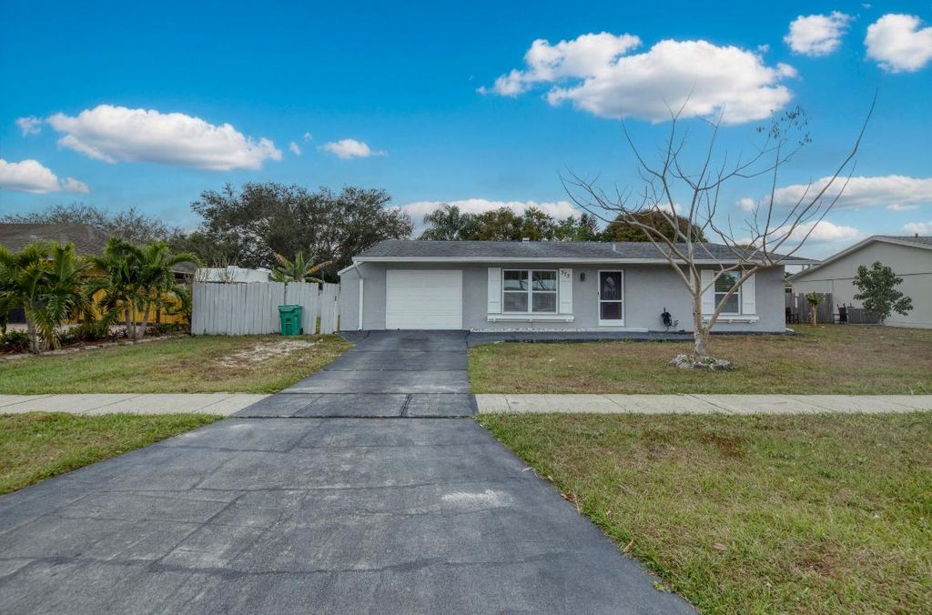 Photo of 372 NE Ardsley Drive, Port Saint Lucie, FL 34983 (MLS # R11155342)