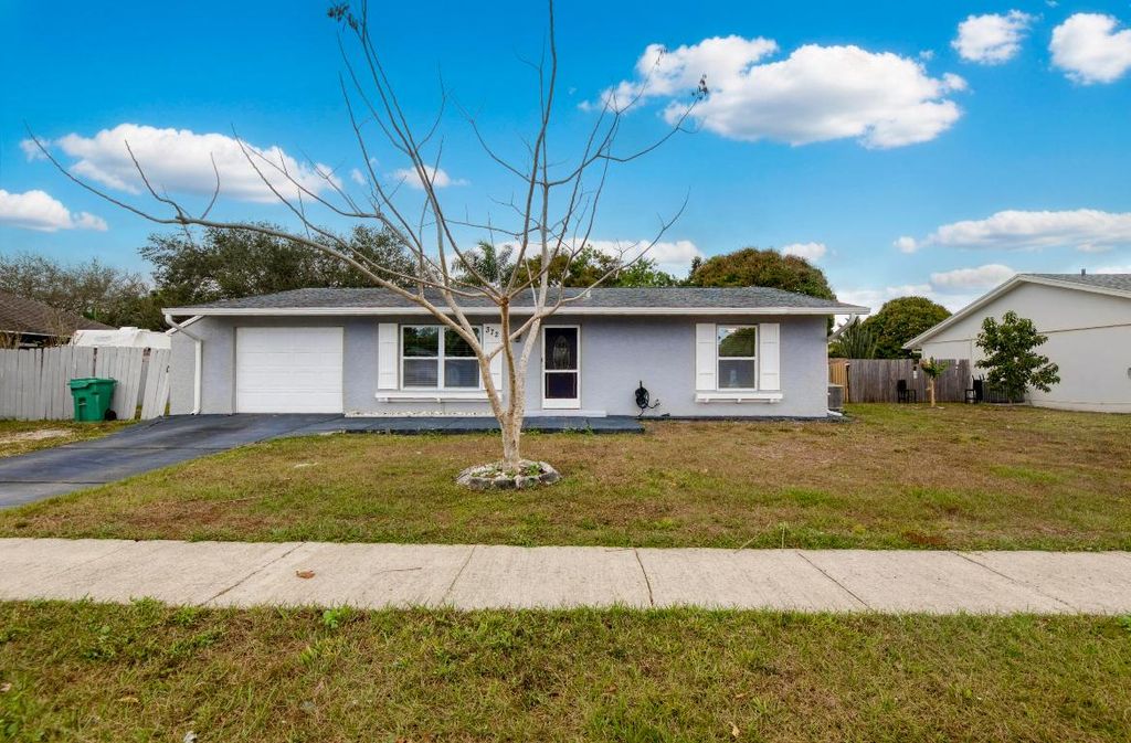 Photo of 372 NE Ardsley Drive, Port Saint Lucie, FL 34983 (MLS # R11155342)