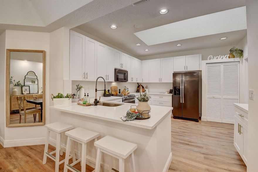 Recently renovated 2/2 condo plus office/ sunroom with and bonus murphy bed. You will feel like you walked into a Better Homes and Gardens feature property when opening the front door. Quartz counters tops, stainless steal appliances and beautiful flooring through out this open and airy floor plan. Only a few minutes walk to the local community pool. Located in the Active 55 and older community of Palm Isles which is just minutes from Delray Beaches Market Place and about 10 mins to Downtown on Atlantic Ave. Palm Isles amenities include multiple tennis and pickleball courts, indoor and outdoor pools great for swimming year round. HOA includes Water, ADT, Cable and internet.