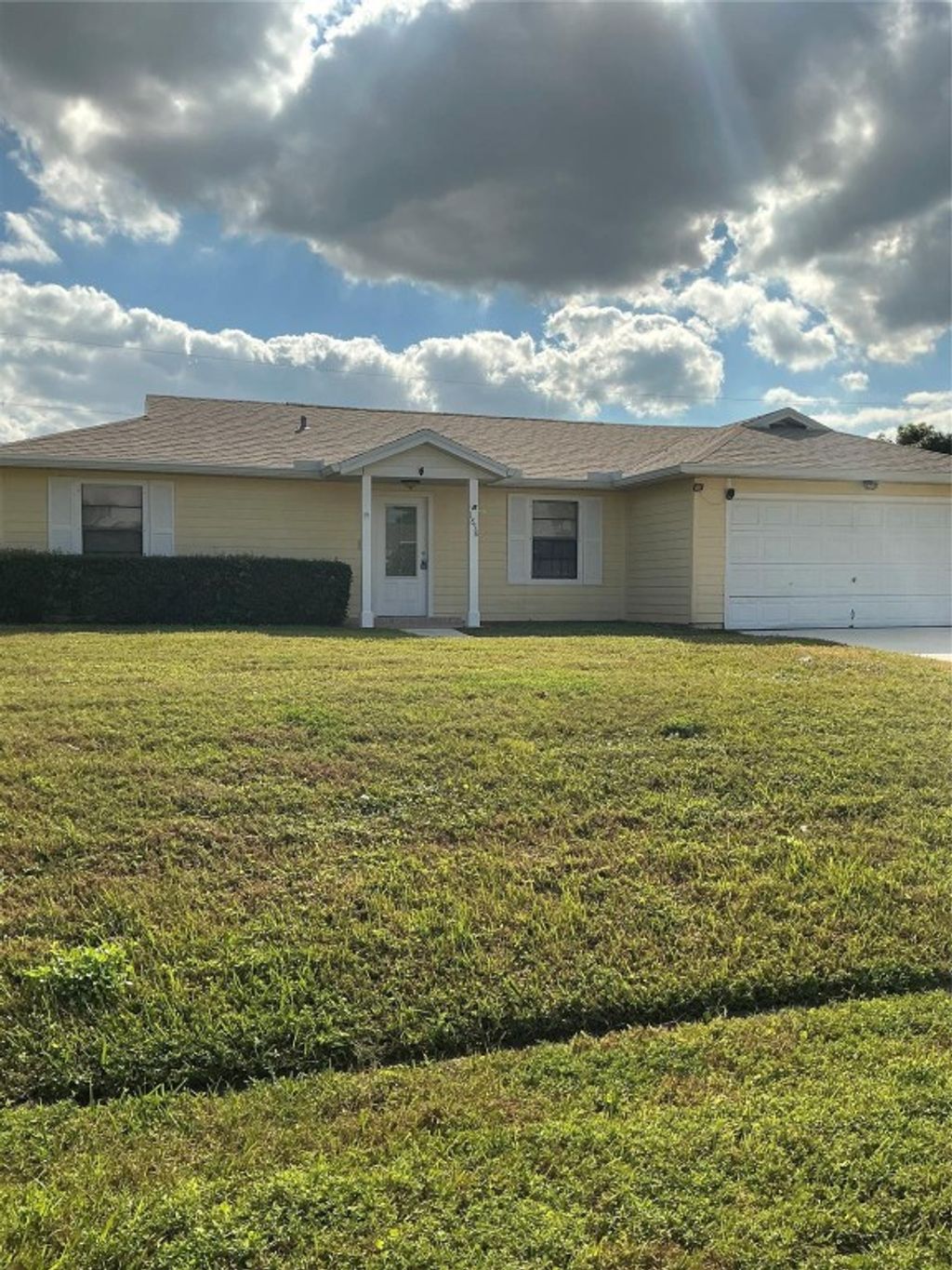 Photo of 1858 SW Capehart Avenue, Port Saint Lucie, FL 34953 (MLS # F10525779)