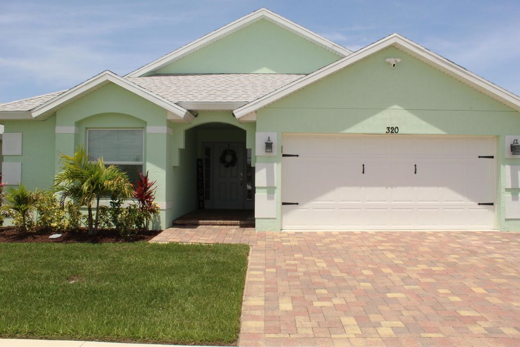 Photo of 320 Palm Breezes Drive Dr, Fort Pierce, FL 34945 (MLS # R10809249)