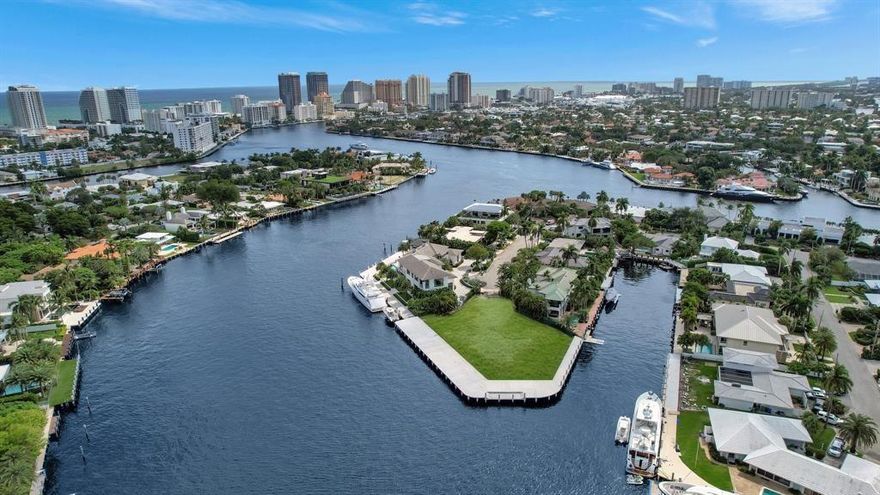 *POINT LAND SALE * Extraordinary lot, almost 22,000 sf of land & 366 ft of new sea wall with expanded concrete dock! Superbly located on gated Sunrise Key with 64 waterfront-only luxury residences & deepest waterfront in Fort Lauderdale. Privacy & serenity close to Las Olas, beaches & top schools. A full set of architectural plans by Kobi Karp are PERMIT READY saving potential buyer substantial investment, years of planning, design & permitting! Landscape design Craig Reynolds & professional interior design renderings also prepared. The proposed residence offers 3 levels & guest quarters totaling apx 11,000 sf. 3 docks, perfect for large/multiple yachts:174 ft straight line dock, point dock 73ft (perfect boat lift area) & 119 ft protected dock side canal. No access without listing agent