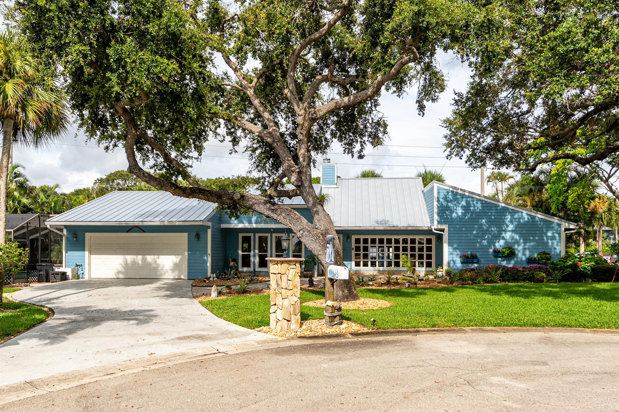 Prestigious Sewall's Point! This 3-bed, 2.5-bath home with 2-car garage is tucked away on a cul-de-sac with water views from the living room. Enjoy a screened-in pool, spacious layout, and top-rated Martin County schools. Perfect for families or luxury buyers seeking comfort, privacy, and location. Minutes to beaches, shopping, and downtown Stuart. Don't miss this rare opportunity!