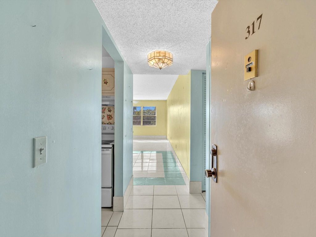 Photo of 1516 S Lakeside Dr #317, Lake Worth Beach, FL 33460 (MLS # F10533909)