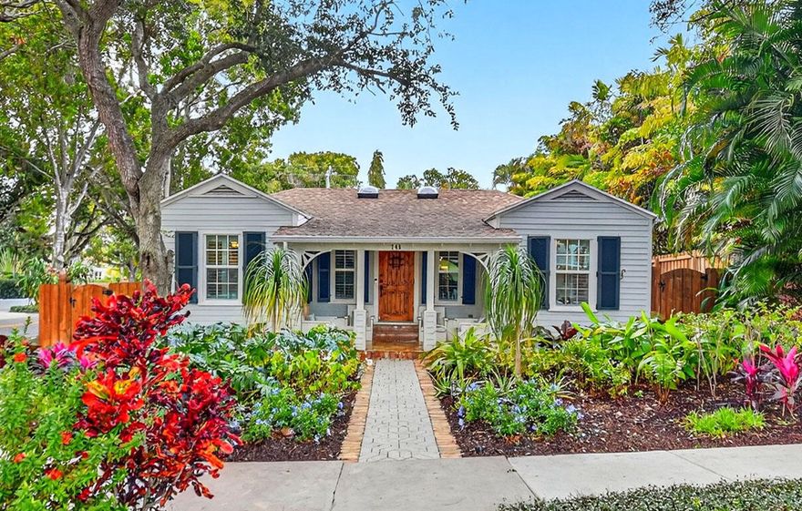 A rare architectural treasure set on a desirable corner lot, this 1,811-square-foot residence (2,482 total square feet) has been masterfully reimagined to seamlessly blend traditional Key West charm with a refined Craftsman interior. Recipient of the prestigious Historic Preservation Award in 2010, the home stands as a timeless tribute to thoughtful design and enduring quality.

Positioned to maximize space and natural light, the corner setting offers an open, airy feel with room to breathe. Constructed of solid cypress, the residence showcases exceptional craftsmanship throughout -- from exposed rafter tails and vaulted, beamed ceilings to original oak flooring and custom built-ins. Skylights bathe the interiors in natural light, highlighting curated architectural details at every turn. The thoughtfully designed layout features three bedrooms and two baths, including a serene primary suite complete with a walk-in closet and French doors that open to a tranquil loggia. Step outside to a lushly landscaped private oasis where a saltwater pool, champagne spa, and one-of-a-kind water feature create a retreat that captures the historic essence of the neighborhood. Every element of the outdoor space has been intentionally designed to complement the home's character while delivering a refined luxury experience.

Designed for both everyday living and elegant entertaining, the home offers inviting gathering spaces, a spacious pantry, and seamless indoor-outdoor connectivity. A fully fenced rear yard ensures privacy, while the custom-built front porch enhances curb appeal and welcomes guests warmly. Two designated parking spaces add convenience.

For added peace of mind, the property is equipped with impact windows and doors, a 2021 roof, 2021 water heater, as well as two A/C units installed in 2021 and 2022.

Located in the highly regarded historic neighborhood of Flamingo Park, residents enjoy mature, tree-lined streets, charming architecture, and walkable sidewalks that foster a true sense of community. Just minutes from Downtown West Palm Beach, CityPlace, pristine beaches, and the airport, this exceptional property offers the perfect balance of serenity and accessibility.

A distinctive corner-lot residence where history, craftsmanship, and location come together in perfect harmony.
