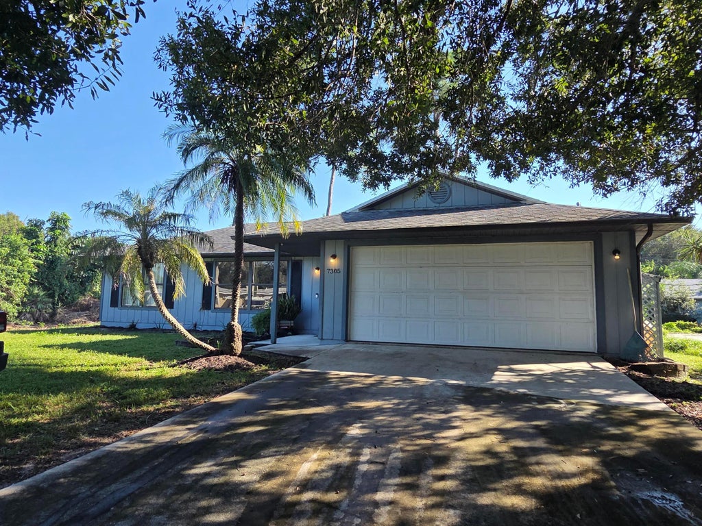 Photo of 7305 PACIFIC Avenue, Fort Pierce, FL 34951 (MLS # B26091460)